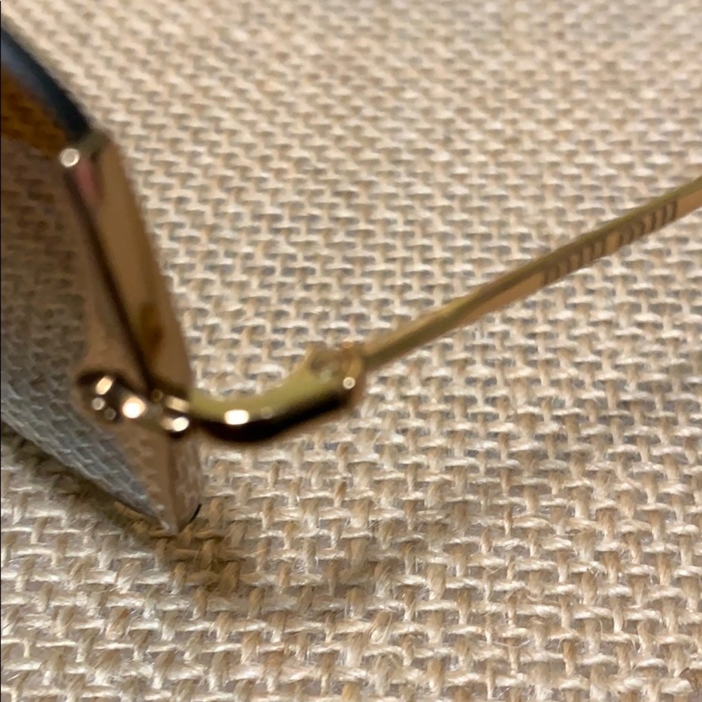 MIU MIU Frameless Super Lightweight Sunglasses - Picture 6 of 10